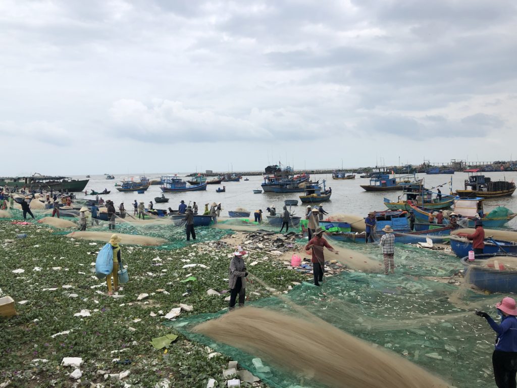 Vietnamese fishermen and nets
