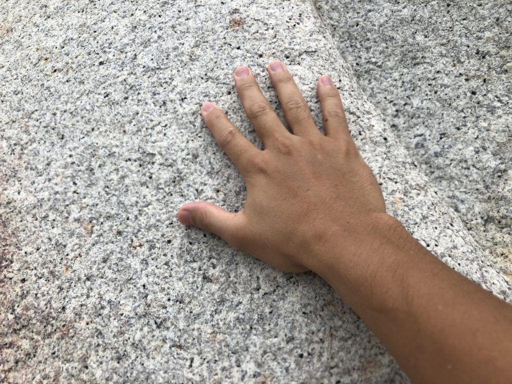 Ke Ga's rock and hand