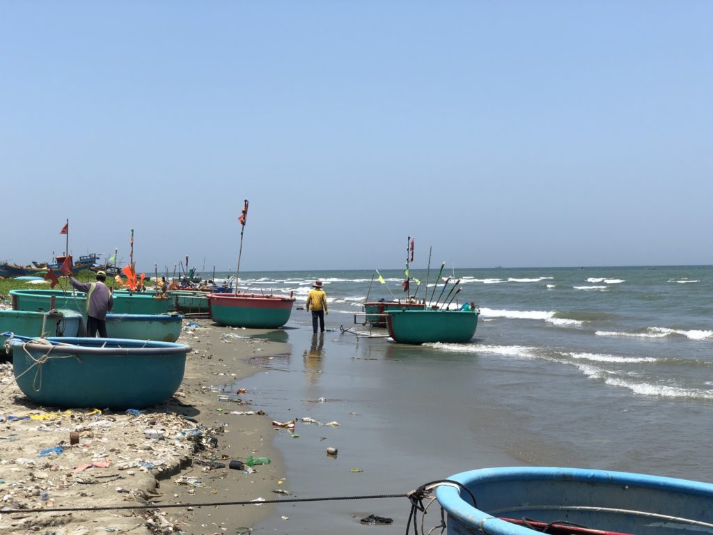 Fishing village on the west coast of Mui Ne. Lined with round boats.