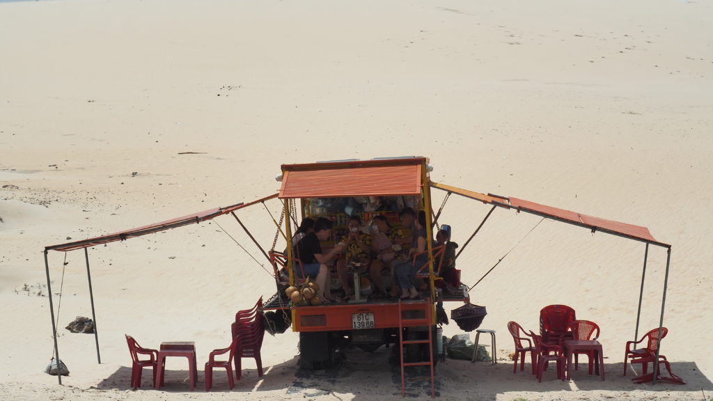 Mobile vendors parked and operating on the dunes