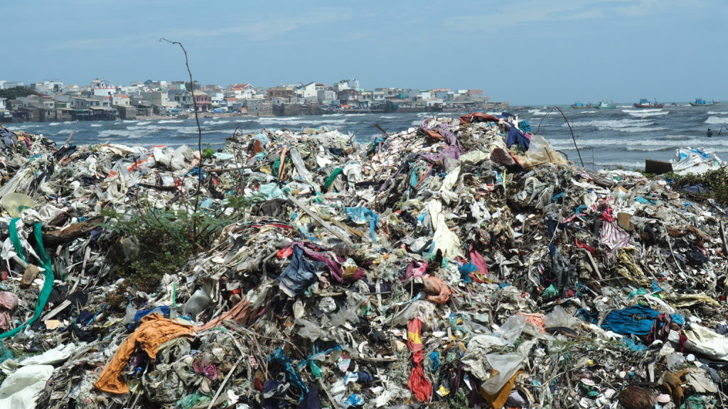 Chi Cong beach in Vietnam with a landfill of garbage on the beach