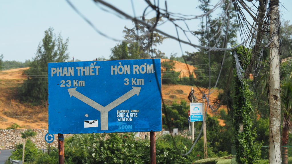 Road signs. Phan Thiet on the left, Hon Rom on the right.